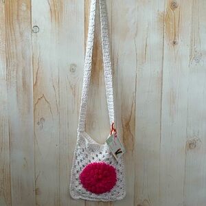 Bohemian Crochet Crossbody Bag with Pink Floral Accent
